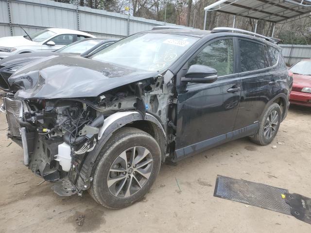 TOYOTA RAV4 HV LE 2018 with VIN JTMRJREV3JD242014 - Photo from auction