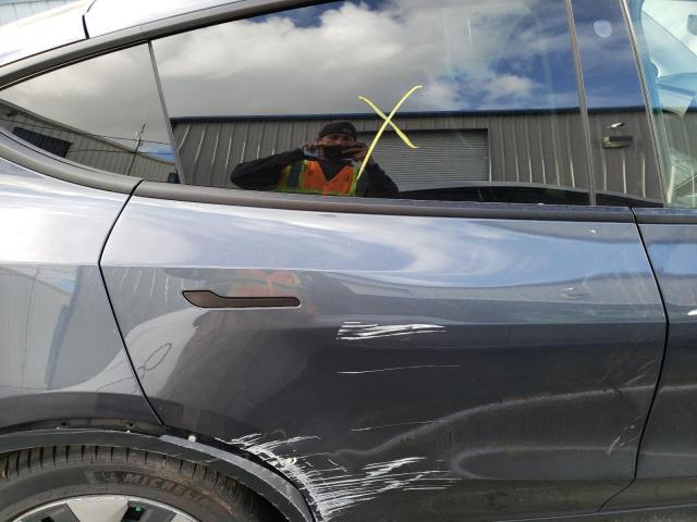 Photo 10 from auction – 2021 TESLA MODEL Y with VIN 5YJYGDEE8MF074784