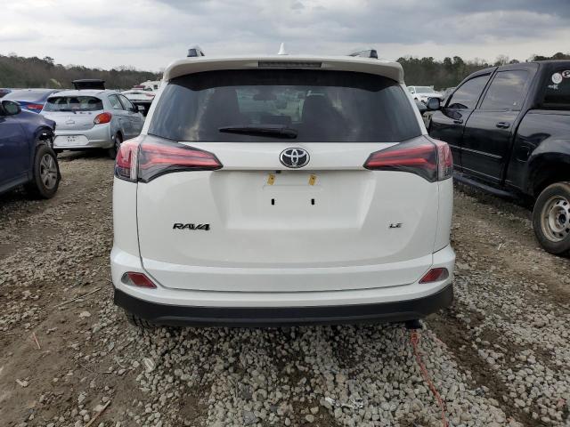Photo 6 from auction – 2018 TOYOTA RAV4 LE with VIN JTMZFREV2JJ736187