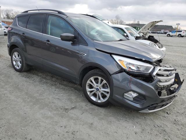 Photo 4 from auction – 2018 FORD ESCAPE SE with VIN 1FMCU0GD2JUC13130