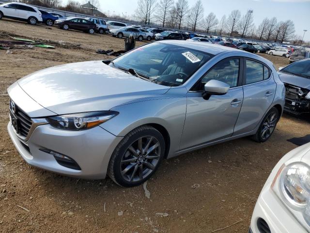 MAZDA 3 TOURING 2018 with VIN 3MZBN1L38JM238132 - Photo from auction