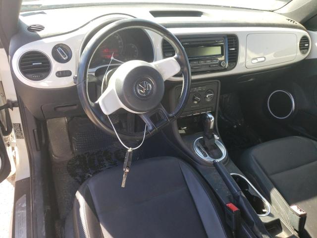 Photo 8 from auction – 2012 VOLKSWAGEN BEETLE with VIN 3VWJX7AT4CM634475