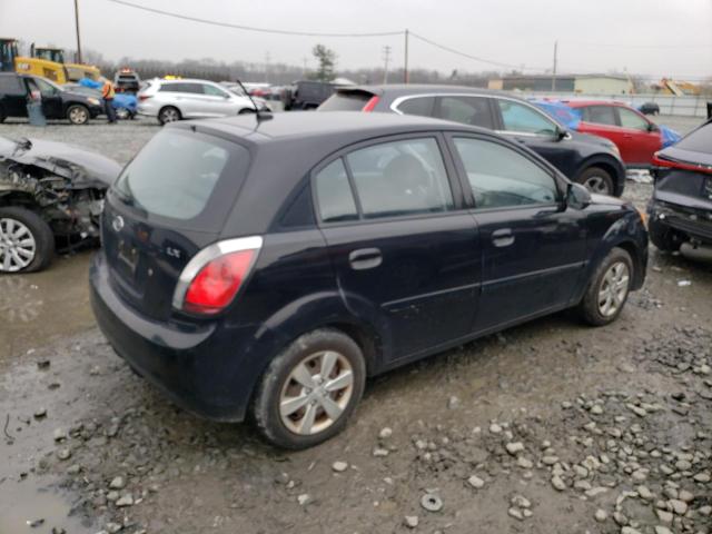 Photo 3 from auction – 2011 KIA RIO BASE with VIN KNADH5A30B6767750