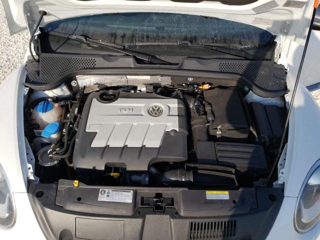 Photo 11 from auction – 2014 VOLKSWAGEN BEETLE with VIN 3VW5L7AT7EM817854