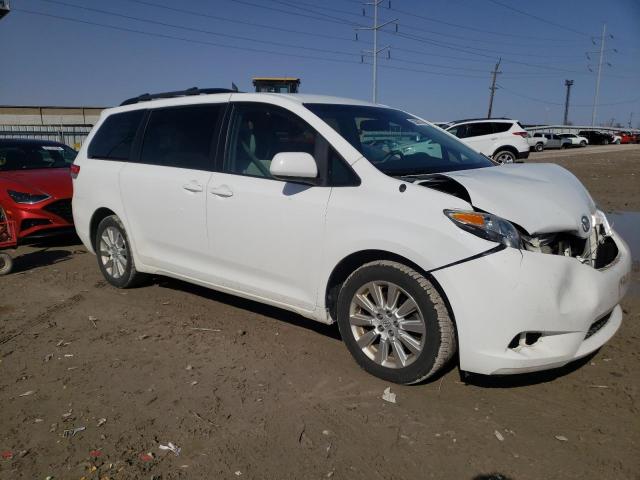 Photo 4 from auction – 2014 TOYOTA SIENNA LE with VIN 5TDJK3DC8ES080849
