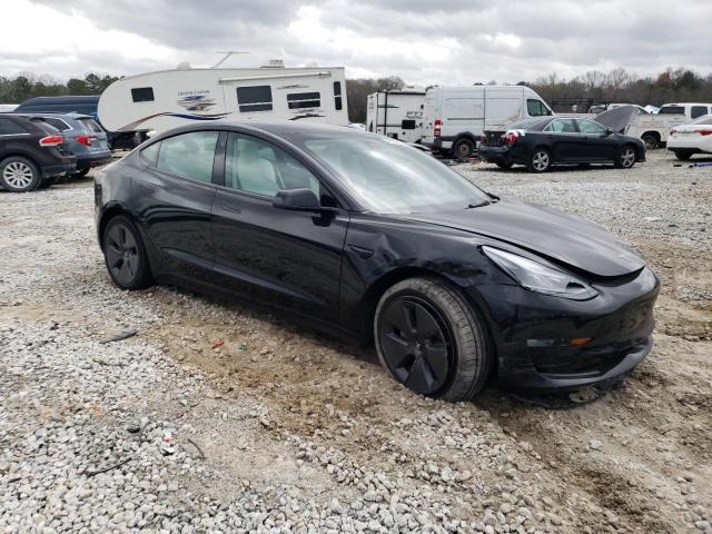 Photo 4 from auction – 2022 TESLA MODEL 3 with VIN 5YJ3E1EB3NF329511