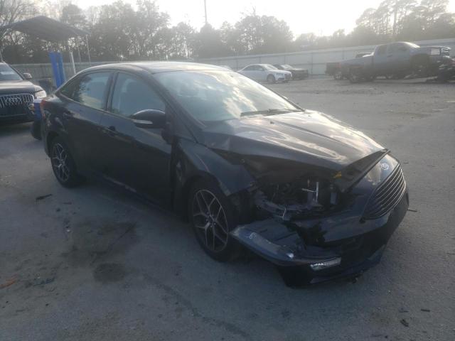 Photo 4 from auction – 2017 FORD FOCUS SE with VIN 1FADP3FE5HL223037