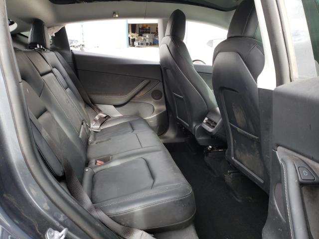 Photo 11 from auction – 2022 TESLA MODEL Y with VIN 7SAYGDEE1NF506720