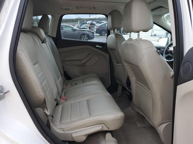Photo 11 from auction – 2015 FORD ESCAPE TIT with VIN 1FMCU0J99FUB19824