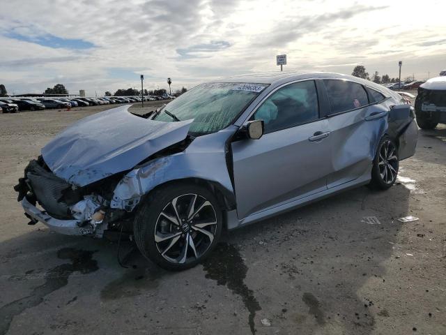 HONDA CIVIC SI 2017 with VIN 2HGFC1E5XHH704694 - Photo from auction