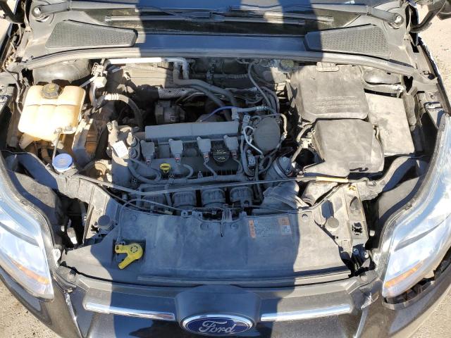 Photo 11 from auction – 2014 FORD FOCUS SE with VIN 1FADP3F23EL429510
