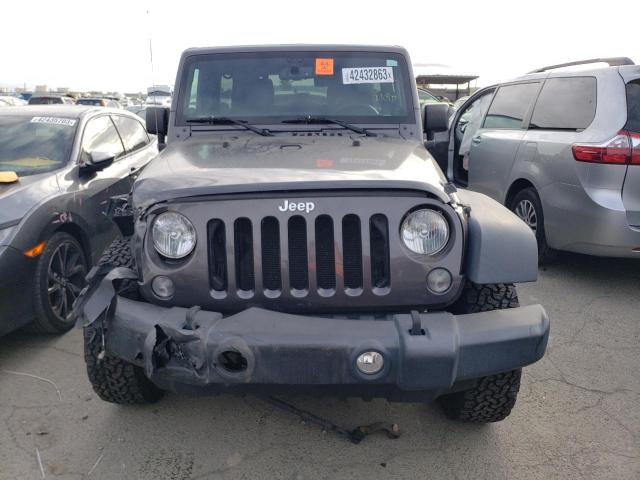 Photo 5 from auction – 2014 JEEP WRANGLER U with VIN 1C4BJWFG3EL286039