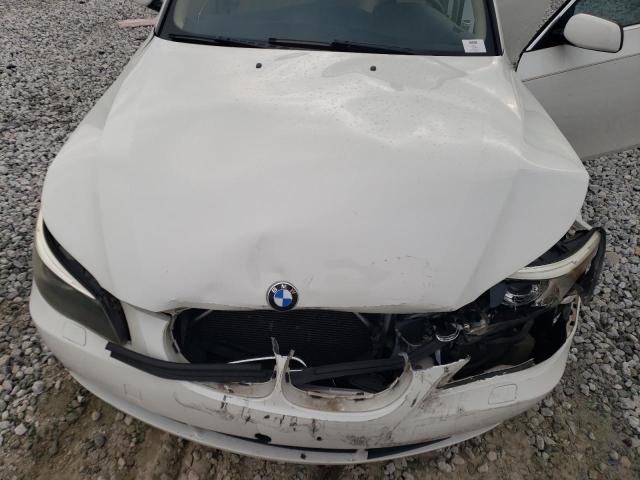 Photo 11 from auction – 2006 BMW 530 I with VIN WBANE735X6CM30212
