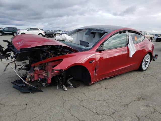TESLA MODEL 3 2021 with VIN 5YJ3E1EAXMF049896 - Photo from auction