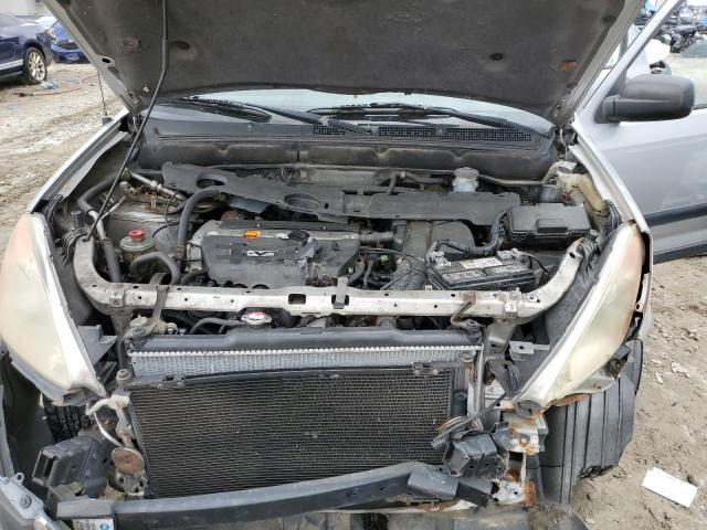 Photo 12 from auction – 2004 HONDA CR-V LX with VIN JHLRD68454C008558