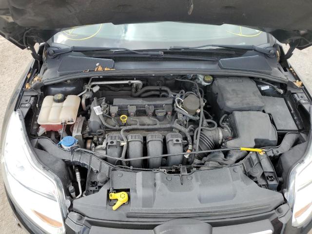 Photo 11 from auction – 2014 FORD FOCUS SE with VIN 1FADP3F29EL204069
