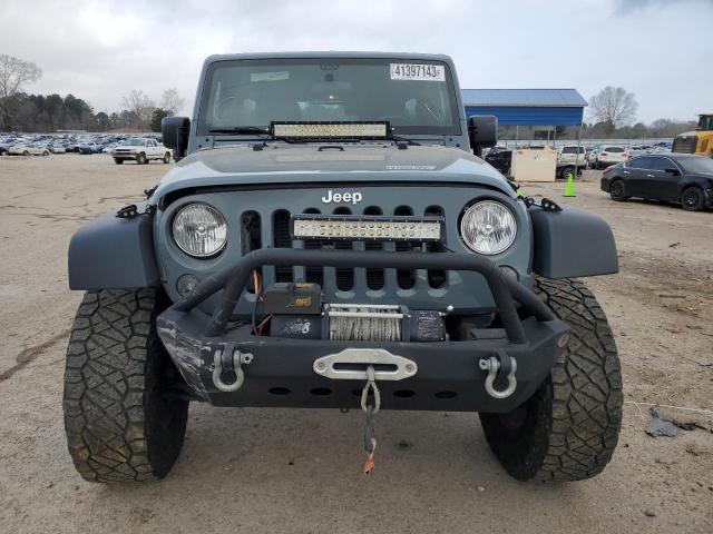 Photo 5 from auction – 2014 JEEP WRANGLER U with VIN 1C4BJWDGXEL141843