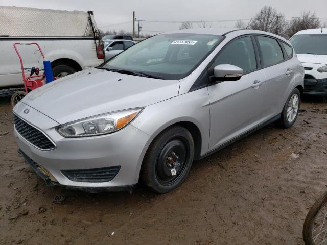 FORD FOCUS SE 2017 with VIN 1FADP3K27HL330683 - Photo from auction