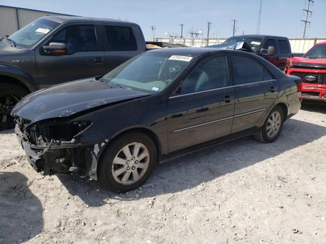 TOYOTA CAMRY 2003 with VIN 4T1BF30K03U056863 - Photo from auction