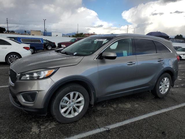 KIA SORENTO LX 2016 with VIN 5XYPG4A32GG168513 - Photo from auction