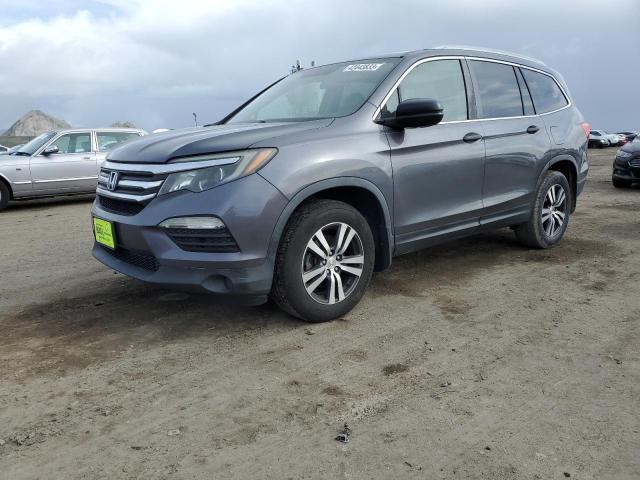 HONDA PILOT LX 2016 with VIN 5FNYF5H18GB029317 - Photo from auction