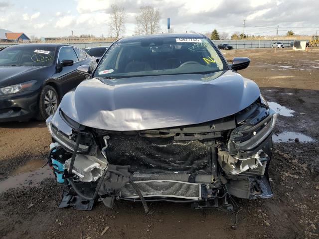 Photo 5 from auction – 2021 HONDA INSIGHT EX with VIN 19XZE4F57ME010850