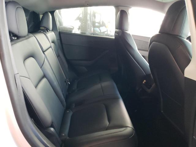 Photo 11 from auction – 2022 TESLA MODEL Y with VIN 7SAYGDEE3NF401399