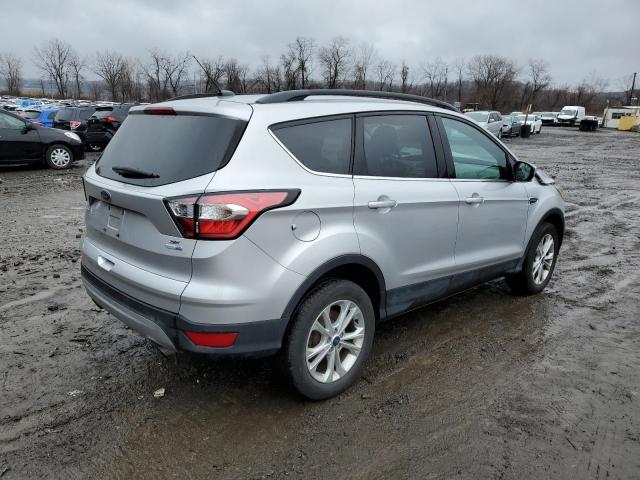 Photo 3 from auction – 2018 FORD ESCAPE SE with VIN 1FMCU9GD9JUB93608