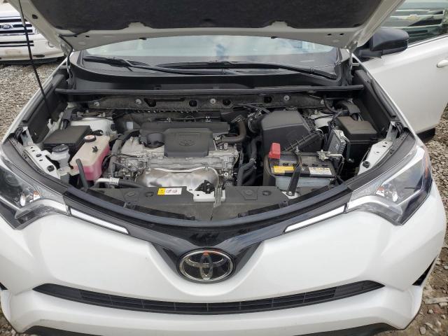 Photo 12 from auction – 2018 TOYOTA RAV4 LE with VIN JTMZFREV2JJ736187