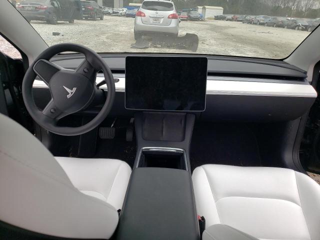 Photo 8 from auction – 2022 TESLA MODEL 3 with VIN 5YJ3E1EB3NF329511