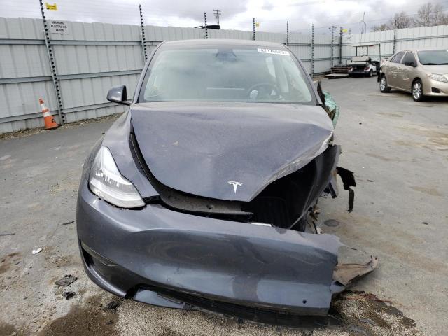 Photo 5 from auction – 2022 TESLA MODEL Y with VIN 7SAYGDEE1NF506720