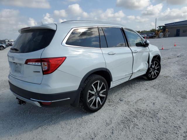 Photo 3 from auction – 2022 HONDA PILOT TOUR with VIN 5FNYF5H65NB020079
