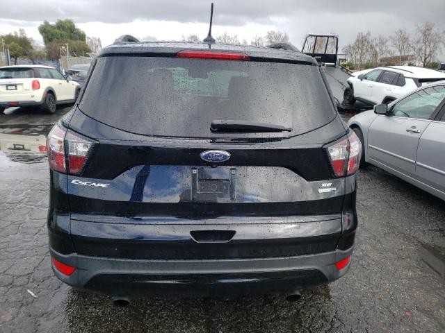 Photo 6 from auction – 2018 FORD ESCAPE SE with VIN 1FMCU9GD3JUA99532