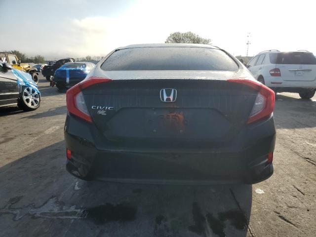Photo 6 from auction – 2018 HONDA CIVIC LX with VIN 19XFC2F57JE008041