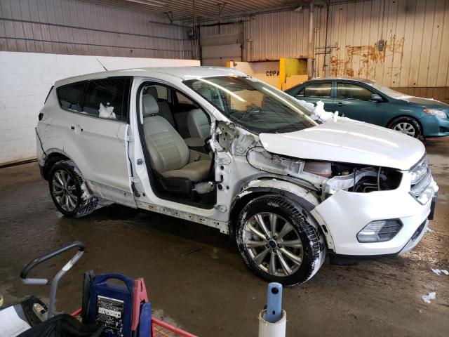 Photo 4 from auction – 2017 FORD ESCAPE TIT with VIN 1FMCU9J96HUC99254