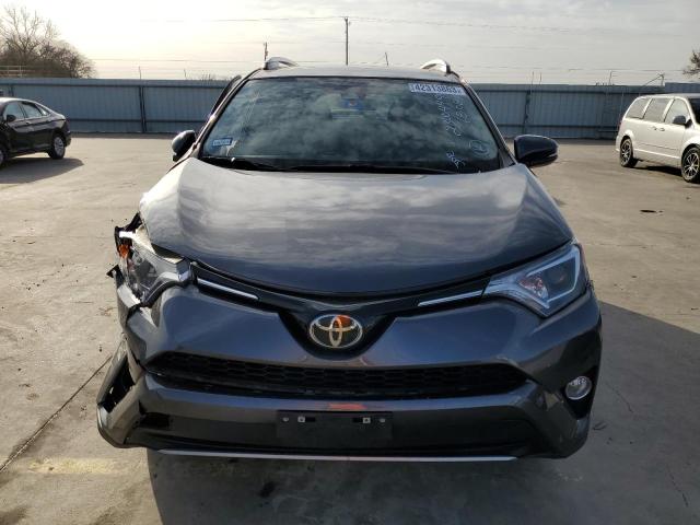 Photo 5 from auction – 2017 TOYOTA RAV4 XLE with VIN JTMWFREV5HJ705660