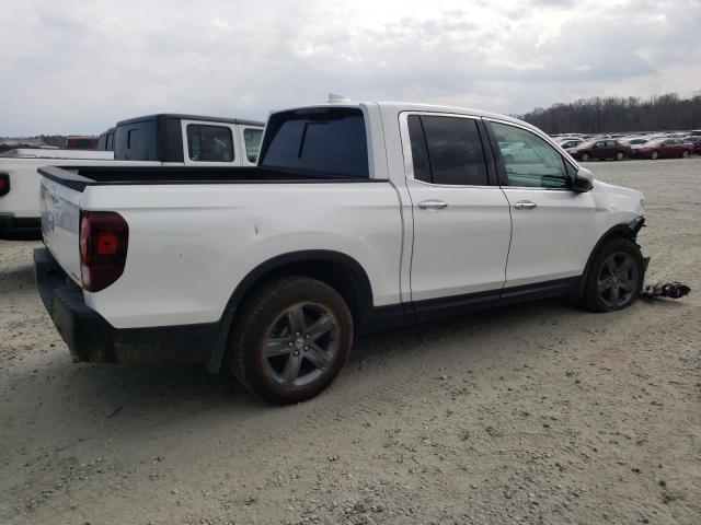 Photo 3 from auction – 2022 HONDA RIDGELINE with VIN 5FPYK3F79NB007970