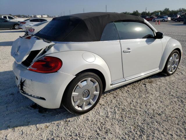 Photo 3 from auction – 2014 VOLKSWAGEN BEETLE with VIN 3VW5L7AT7EM817854