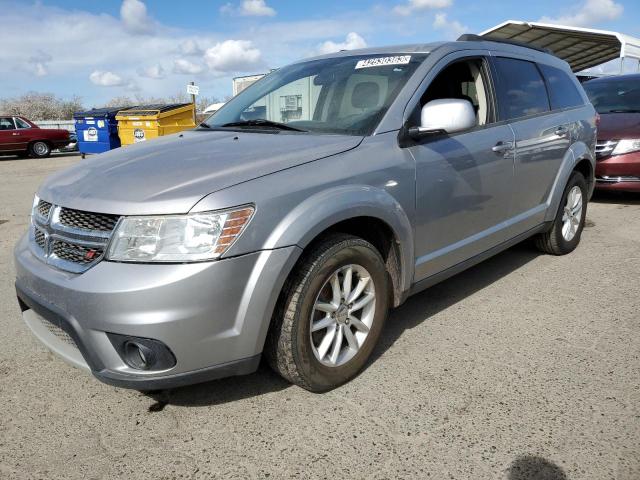 DODGE JOURNEY SX 2015 with VIN 3C4PDCBG0FT697289 - Photo from auction