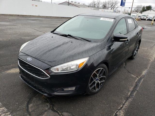 FORD FOCUS SE 2015 with VIN 1FADP3F25FL273455 - Photo from auction