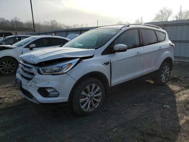 FORD ESCAPE TIT 2017 with VIN 1FMCU9JD0HUE89202 - Photo from auction