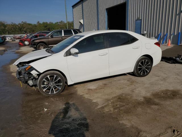 TOYOTA COROLLA L 2018 with VIN 5YFBURHE4JP810272 - Photo from auction