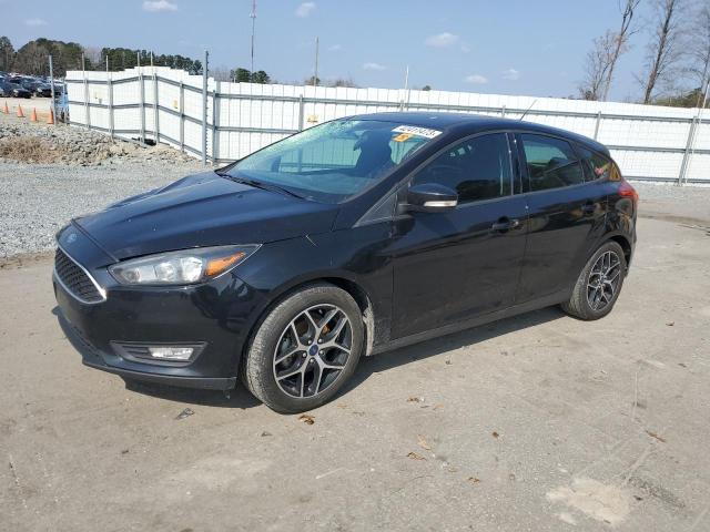 FORD FOCUS SEL 2017 with VIN 1FADP3M29HL337132 - Photo from auction