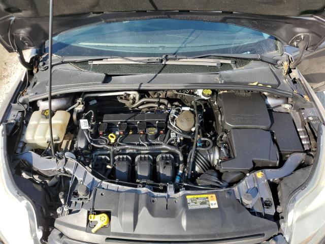 Photo 11 from auction – 2014 FORD FOCUS SE with VIN 1FADP3F23EL171537