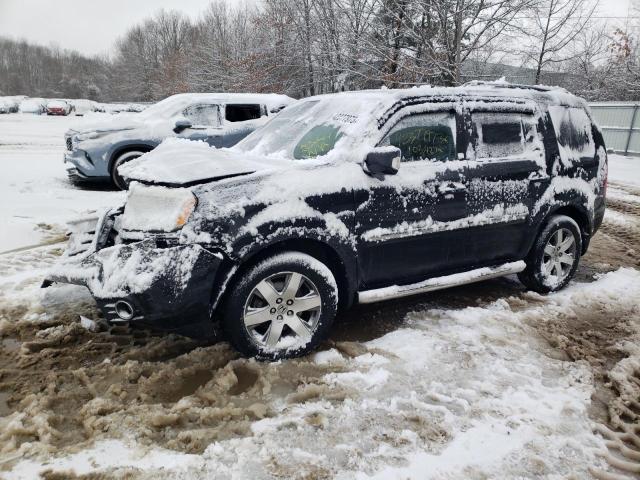 HONDA PILOT TOUR 2014 with VIN 5FNYF4H98EB019769 - Photo from auction