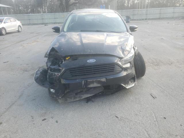 Photo 5 from auction – 2017 FORD FOCUS SE with VIN 1FADP3FE5HL223037