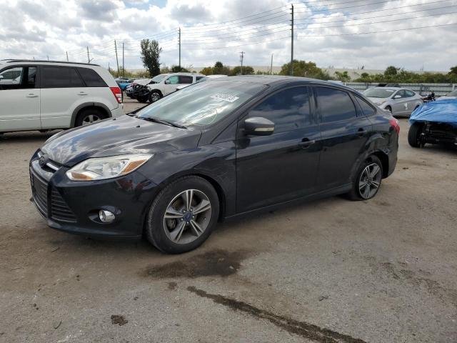 FORD FOCUS SE 2014 with VIN 1FADP3F29EL204069 - Photo from auction