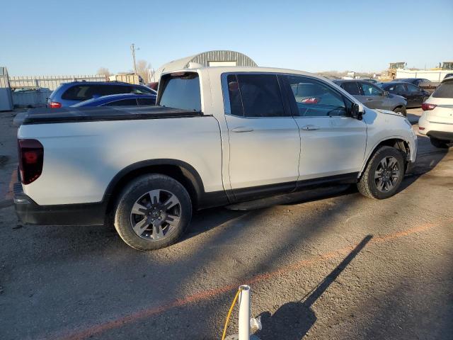 Photo 3 from auction – 2017 HONDA RIDGELINE with VIN 5FPYK3F68HB006997