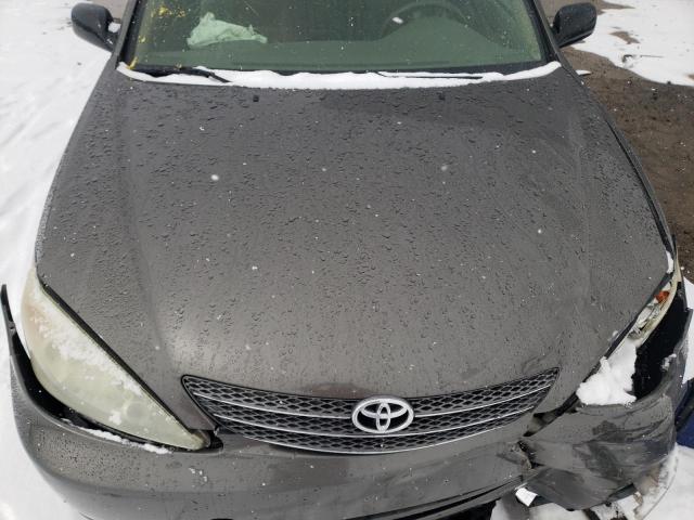 Photo 11 from auction – 2003 TOYOTA CAMRY LE with VIN JTDBE32K030198660