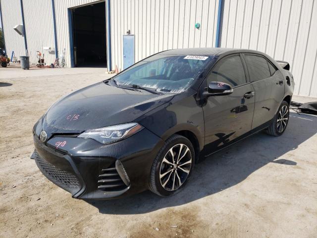 TOYOTA COROLLA L 2019 with VIN 5YFBURHEXKP877802 - Photo from auction